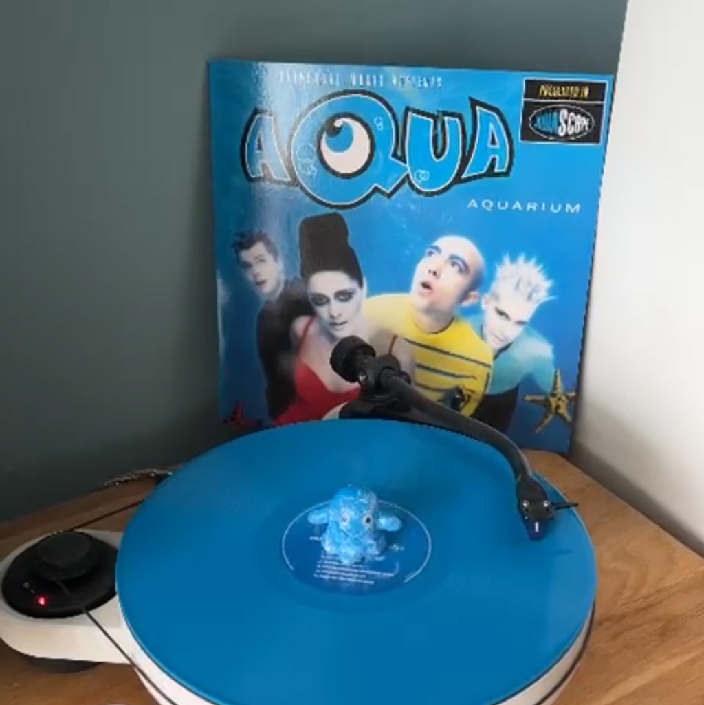 Blue Vinyl Ghost spinning on a blue Aqua vinyl record